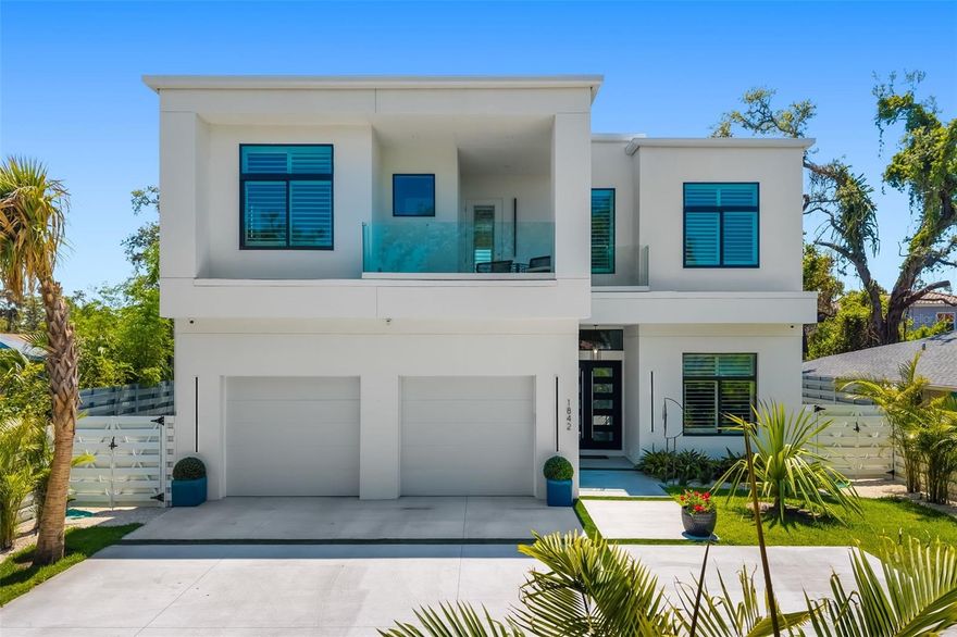 BEST BUY WEST OF TRAIL FOR NEW CONSTRUCTION. Why build when you can move right in. Nearly brand-new custom contemporary masterpiece, completed in December of 2024 and thoughtfully designed with luxurious finishes and top-tier functionality. Located just minutes from world-renowned Siesta Key Beach and vibrant downtown Sarasota, this 4-bedroom, 4.5-bathroom home with a den and bonus room spans approximately 3,200 square feet of exquisite living space.

From the moment you arrive, you’re welcomed by a striking iron and glass front door that sets the tone for the high-end design throughout. The open-concept great room floor plan boasts wide plank French Oak flooring everywhere ( except primary bathroom), soaring ceilings, and pocketing sliders that create seamless indoor-outdoor living.

The gourmet chef’s kitchen is the heart of the home, featuring a Thermador dual fuel range, Monogram refrigerator, Bosch dishwasher, wine refrigeration, quartzite and quartz countertops, custom cabinetry, a spacious cooking island, and a walk-in pantry. The adjacent dining and living areas are perfect for entertaining or relaxing with family.

The stunning main-level primary bedroom suite offers a tranquil retreat with a spa-like bath and custom built closets, while a private den provides an ideal space for work or relaxation. Upstairs, you’ll find three additional spacious en suite guest bedrooms and a large bonus room, perfect for media, hobbies, or a secondary lounge.

Tech lovers will appreciate the impressive AV package, including built-in speakers powered by Sonos technology, multiple Frame TVs, and security cameras. They all stay. Green features include a well for irrigation, Icynene spray foam insulation, insulated garage doors, low voltage night lighting, a gas generator, propane cooking, Low E Impact windows and doors, and a 220V EV charger setup in garage.

Step outside to your private tropical oasis with lush, professional upgraded landscaping, a saltwater pool and spa with fire features, travertine decking, and a picture-frame screen enclosure. The expansive covered lanai features a full outdoor kitchen with a Coyote grill, sink, and refrigeration—perfect for alfresco dining and entertaining.

This barely-lived-in home combines new construction peace of mind with impeccable custom design and location. A rare opportunity to own a true Sarasota gem.  This is a lot of house for this price. Not in a flood zone.