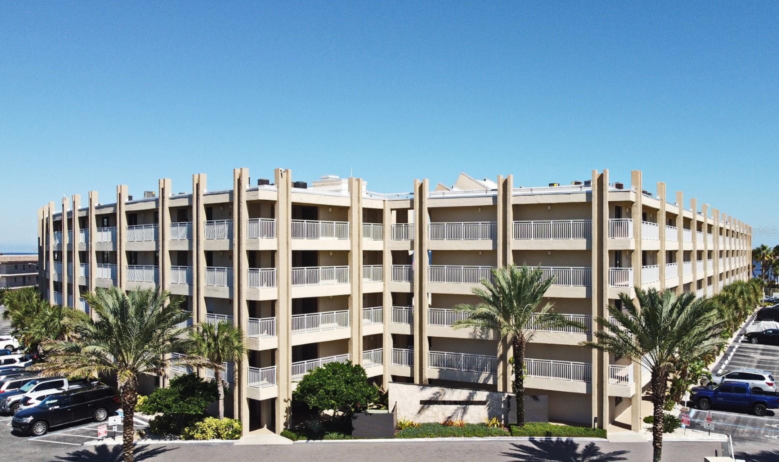 Welcome to your peaceful coastal retreat in the heart of New Smyrna Beach. This beautifully renovated two-bedroom, two-bathroom condo in the highly desirable community of Errol by the Sea offers 1,325 square feet of elegant, modern living perfect for anyone seeking comfort, style, and serenity by the ocean.
The condo has been completely renovated from top to bottom. Every detail is brand new, from the light oak flooring and cabinetry to the furniture, bedding, and high-end appliances. The kitchen is a true centerpiece, featuring stunning quartzite countertops, a built-in sink filtration system, built-in convection ovens, cooktop, dishwasher, disposal, washer/dryer, and wine fridge. A custom coffee bar adds a touch of luxury, creating the perfect space to start your morning while the sun rises over the water.
The open-concept living area flows effortlessly into a stylish seating space with soft blue accents, gold finishes, and large windows that fill the home with natural light. Step onto your private balcony to enjoy the fresh ocean breeze and take in sweeping beach views the perfect place to relax, read, or sip wine at sunset.
Located on the second floor with convenient elevator access, this home combines comfort and accessibility. The Errol by the Sea community offers two resort-style pools and direct beach access, allowing you to stroll along the shoreline or simply unwind by the water just steps from home. The neighborhood is calm, beautifully maintained, and known for its safety and quality, less than ten minutes from Publix, local restaurants, and the heart of downtown New Smyrna Beach.
Experience the very best of coastal living in this chic modern condo, where every detail is designed for beauty, ease, and a true sense of home by the sea.