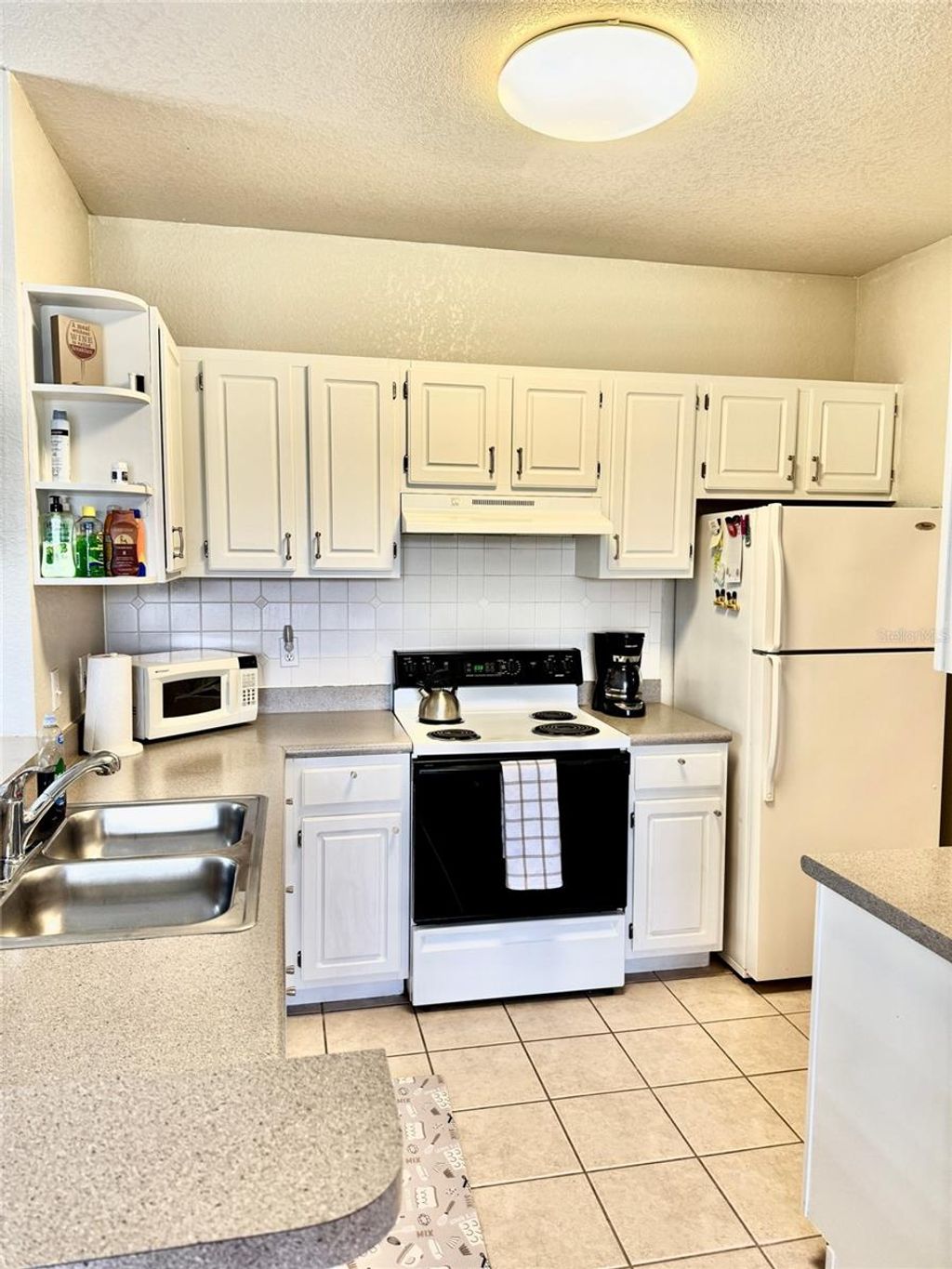 Photo of 8830 Dunes Court #12 306, Kissimmee, FL 34747 (MLS # S5138392)