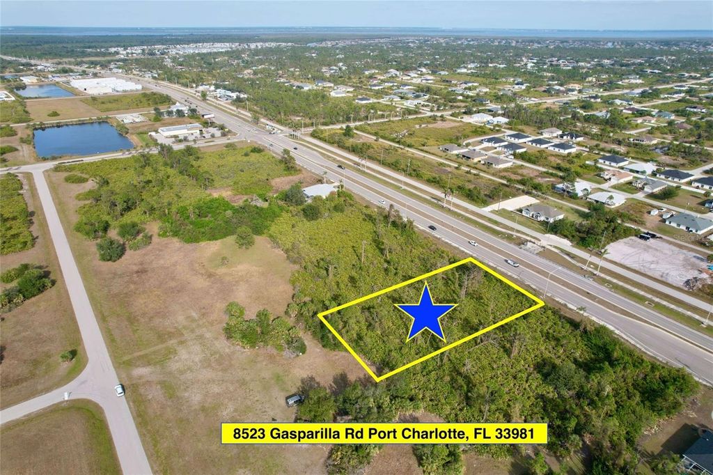 Photo of 8523 Gasparilla Road, Port Charlotte, FL 33981 (MLS # O6300209)