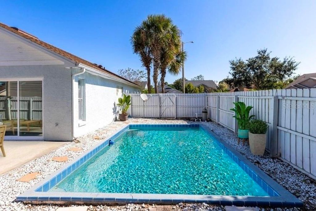 Photo of 3383 Hamlet Loop, Winter Park, FL 32792 (MLS # S5140901)