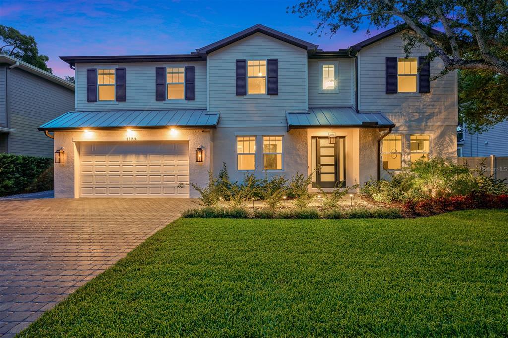 This beautiful home sits on a quiet street in the BAYSHORE BEAUTIFUL neighborhood of South Tampa. The home was recently built in 2021 and features 4,390 square feet with 5 bedrooms, 5.5 bathrooms, an office, mud room, bonus space, upstairs laundry room, oversized 2-car garage, and an entertainer's dream backyard. The kitchen and living area feature a large island, an amazing appliance package with Wolf and Subzero appliances, a walk-in pantry, wine cooler, spacious living room, and breakfast nook. In the backyard, you will be greeted by a covered lanai followed by a large tiki hut fitted with a bar station, two fridges, a sink, grill, LED color-changing lights, Bluetooth speaker, and a TV. If one outdoor grilling area wasn't enough there is an additional area off the side kitchen door plumbed for an outdoor kitchen. The heated pool and spa, surrounded by marble tile, feature color-changing LED lights as well as a fountain and waterfall feature. After getting out of the pool, feel free to rinse off in the outdoor shower or pool bath. At night, the landscape lights and firepit make for a peaceful setting. All outdoor furniture and appliances are included in the sale of the home. The large first-floor bedroom features a walk-in closet and an en suite bathroom with access to the pool area, perfect for guests. Upstairs you will find the master suite, remaining 3 bedrooms, laundry room, and bonus space. The master bathroom features a large walk-in closet with custom shelving, a free-standing tub, rainfall shower, and two large vanities. The remaining 3 bedrooms each have their own gorgeous bathroom and walk-in closet. Other attributes of the home include two tankless
water heaters, an irrigation system, a soft water system, a water filtration system, an ADT security system wired with 3 cameras & a
doorbell, and a mudroom with built-in storage. This home sits in the sought-after Plant/Coleman/Roosevelt school district. Bayshore
Christian School and Academy of The Holy Names are also only steps away. This home is centrally located to many popular areas such
as; Downtown Tampa (5 Miles), Hyde Park Village (3 Miles), South Howard Ave (2.5 Miles), and Historic Bayshore Blvd (2 Blocks). Bayshore BLVD is a great place to walk, run, bike, and watch the annual Gasparilla Pirate Parade. Room Feature: Linen Closet In Bath (Primary Bathroom).