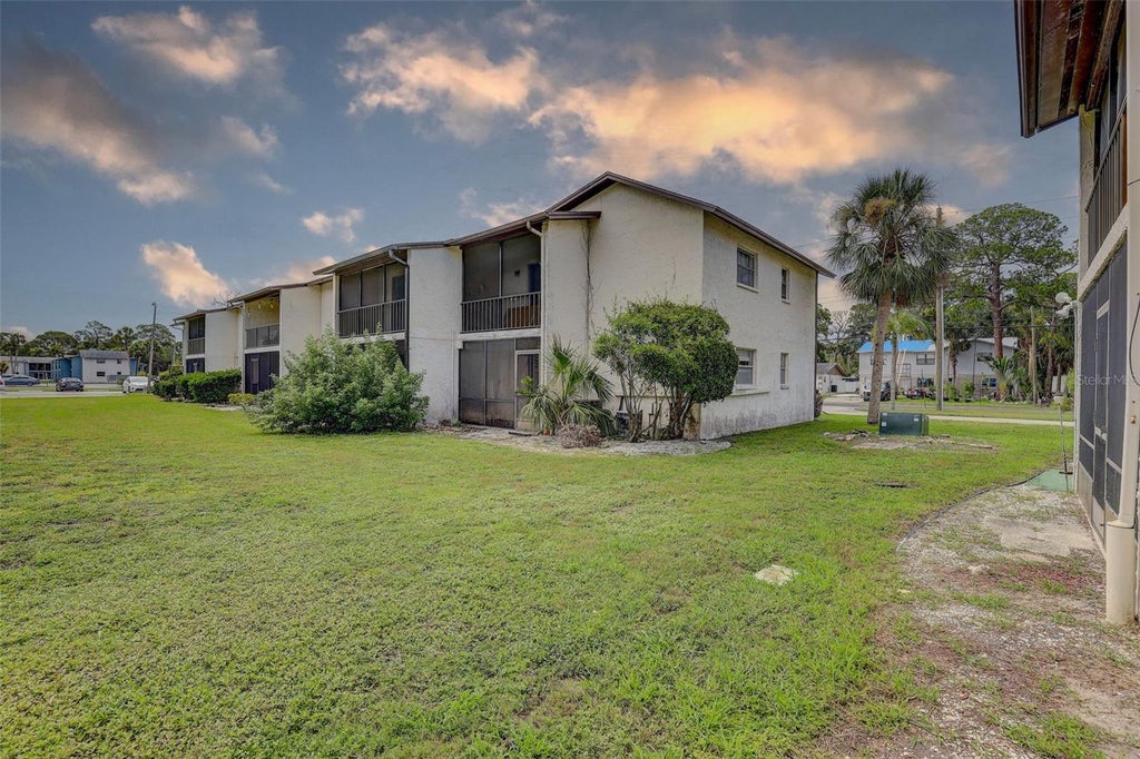 Photo of 8440 Old Post Road #104, Port Richey, FL 34668 (MLS # TB8535889)