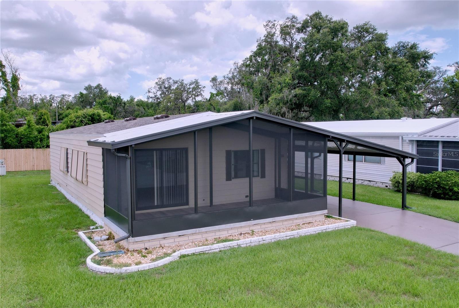 Affordable and close to everything you need. This is Florida living made easy.
This manufactured home built in 1988 is located in the welcoming 55 plus community of Casa Del Sol, where you own the land and pay a low annual HOA fee of $500 dollars.
The screened-in Florida room, carport, roof and A/C were all replaced in 2025. This well maintained home offers relaxed living in a quiet, no pet neighborhood with access to a clubhouse, pool, shuffleboard courts and a full calendar of social activities.
You are just minutes from shopping, dining, medical centers, and all your daily needs. Tampa International Airport is about an hour away, and Orlando’s attractions are easily reachable for weekend fun. Set up your visit to 32594 Bueno Drive Zephyrhills Florida today!
** HOA approval is required to live here.