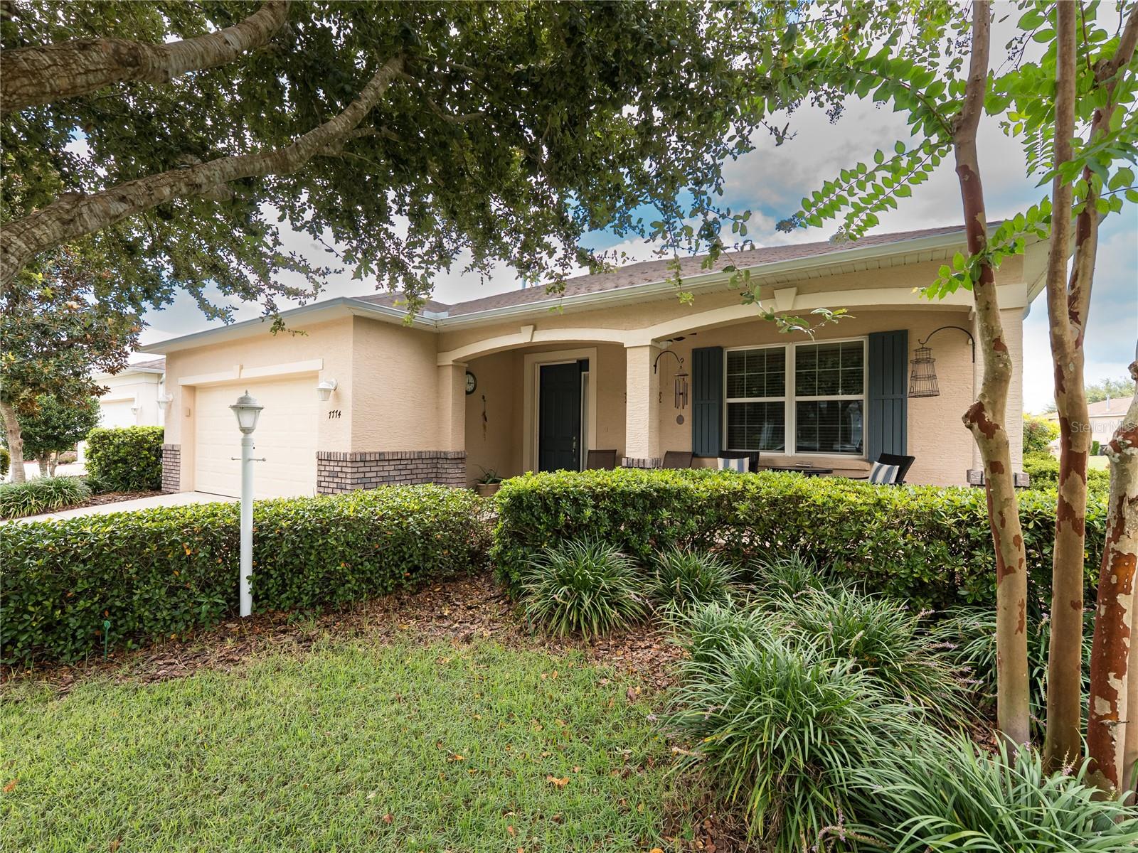 Spacious Wisteria model in the desirable Indigo East Community, located in On Top of the World. This well cared for, original owner home has two large bedrooms and a centrally located flex room with full length glass french doors. You are welcomed from the shaded front porch, through the open concept kitchen, great room, and dining area to the lanai and screened in rear patio. The retractable awning assures extra shade when needed. The kitchen with walk in pantry is a chef's delight with lots of countertop preparation space, gas stovetop and a large center island with extra guest seating on two sides. Your water heater and dryer are also heated with gas. The primary bedroom is roomy enough for dressing/seating area and the en suite bathroom is located just past the duel walk in closets. The HOA covers a wide range of amenities including two pools, community center, dog park and walking trails. Do not miss the opportunity to make this wonderful home yours. Note: The CDD is paid off on this home.
