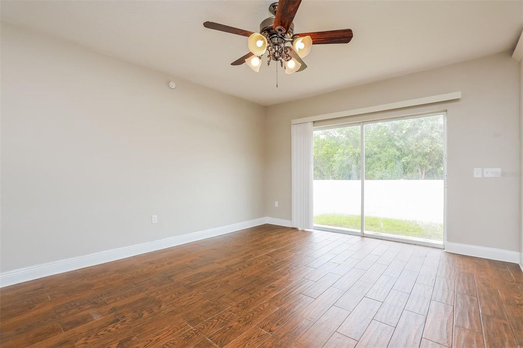 Photo of 207 Taranto Way, Kissimmee, FL 34758 (MLS # O6397491)