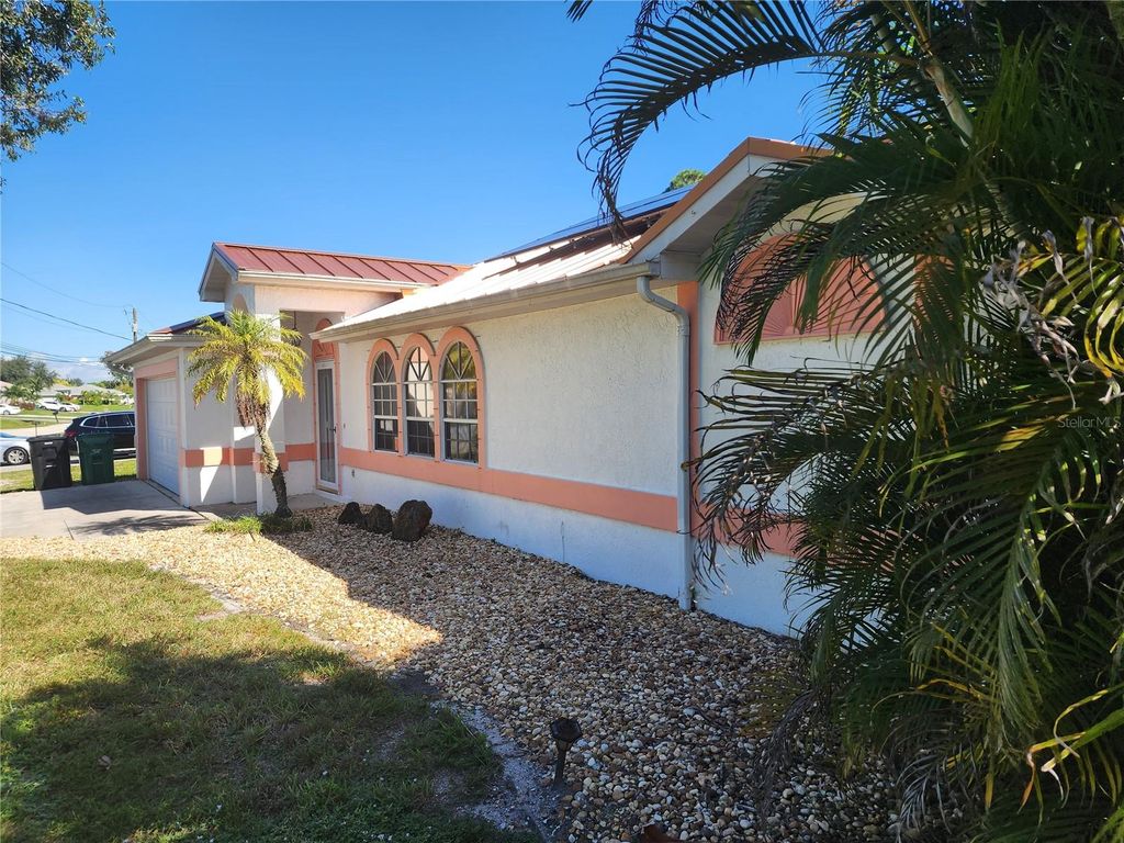 Photo of 4089 SW Kamsler Street, Port Saint Lucie, FL 34953 (MLS # TB8439870)
