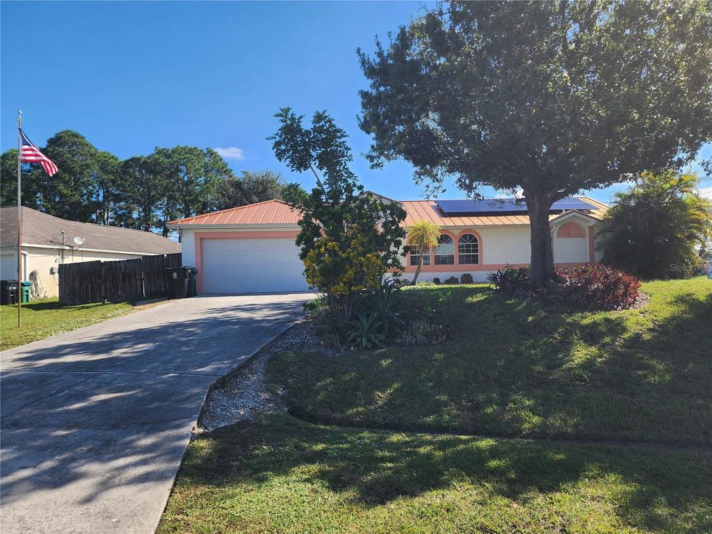 Photo of 4089 SW Kamsler Street, Port Saint Lucie, FL 34953 (MLS # TB8439870)