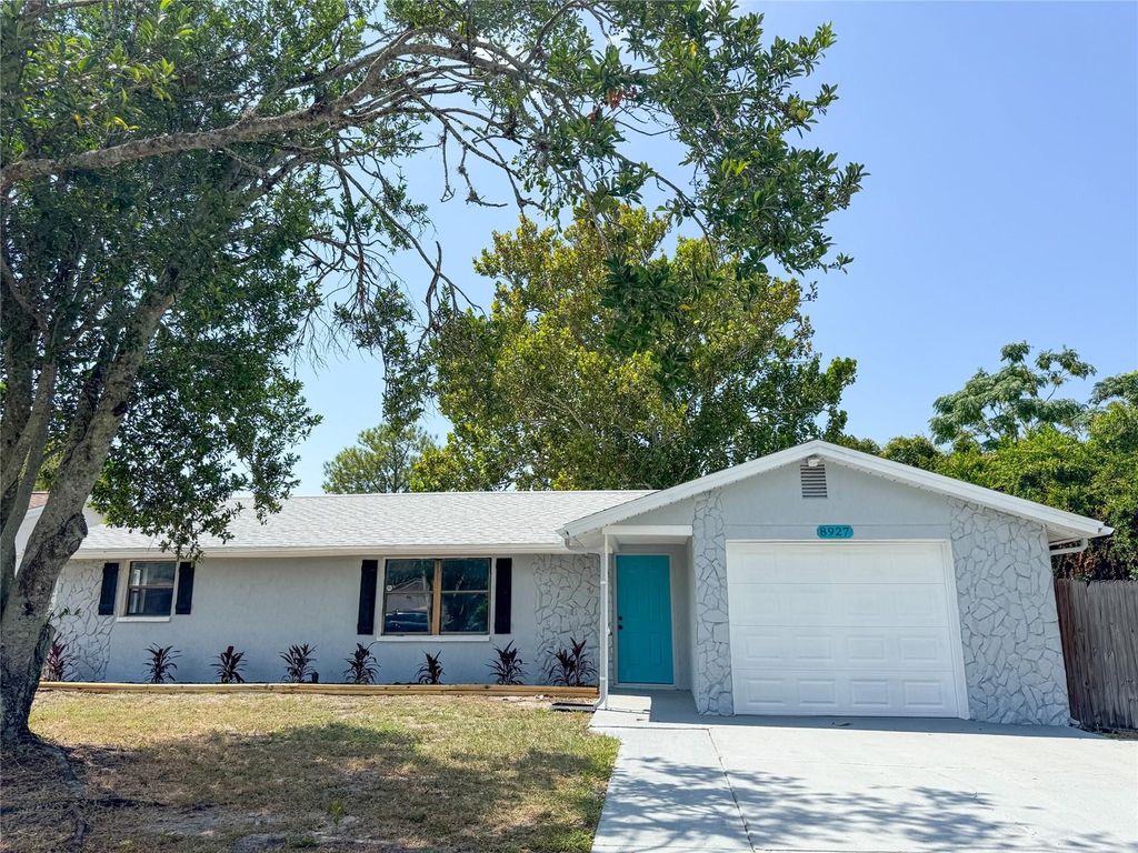 Photo of 8927 Roble Way, Port Richey, FL 34668 (MLS # W7879143)