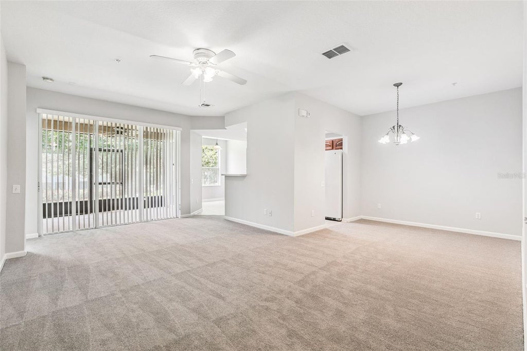 Photo of 6450 Alcalde Court #103, Orlando, FL 32835 (MLS # O6412525)