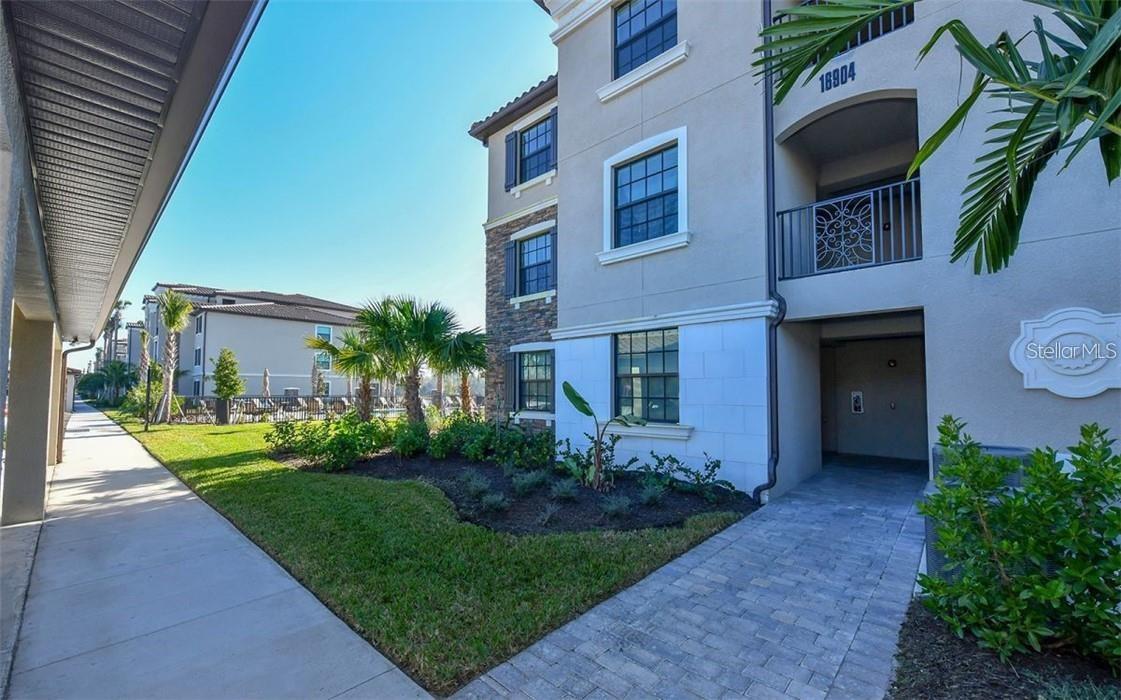 Stunning three-bedroom two-bathroom condo end unit, light, bright and professionally decorated with coastal chic furnishings on the second floor of the sought after golf community of Lakewood National. Enjoy gorgeous views of the golf course as you enter this lovely condo. Plenty of room for the whole family. King bed in master with ensuite bath, queen bed in second bedroom and twin beds in the third bedroom. Just steps to the satellite pool. Enjoy hours of entertainment as you enjoy meals, entertain guests and watch the golfers navigate the new Arnold Palmer designed 36-hole golf course! Enjoy resort style living and state-of-the-art amenities such as: CLUBHOUSE WITH RESTAURANT AND TIKI BAR, FITNESS CENTER, RESORT STYLE SWIMMING POOLS WITH OUTDOOR GRILLE AND POOLSIDE SERVICE, A FULL-SERVICE SPA , TENNIS, PICKLE BALL COURTS AND MORE! Golf Membership transfer available. $65.00 monthly min. expenditure is required at the on-site Tiki Bar/Restaurant (Alcohol Excluded). Easy access to I-75, local shopping and dining, University Parkway, Sarasota Airport and all that Lakewood Ranch has to offer. ALL UTILITIES INCLUDED WITH MONTHLY CAP!