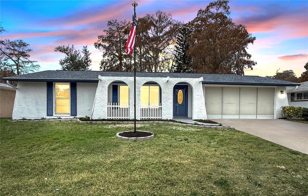 Photo of 7730 Cherrytree Lane, New Port Richey, FL 34653 (MLS # W7882106)