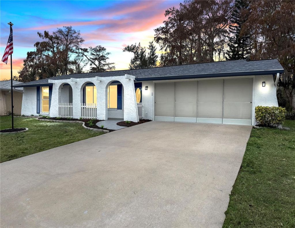 Photo of 7730 Cherrytree Lane, New Port Richey, FL 34653 (MLS # W7882106)