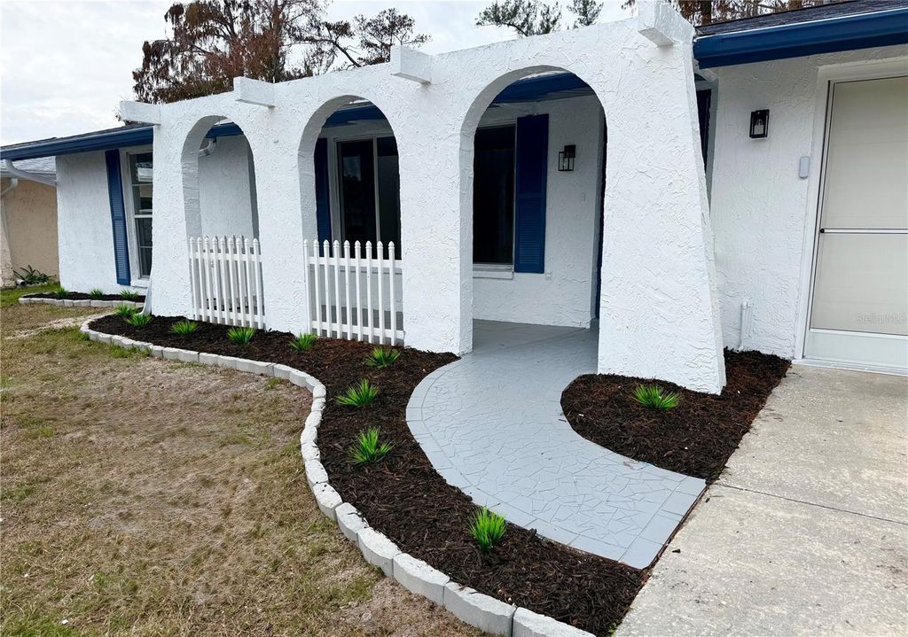 Photo of 7730 Cherrytree Lane, New Port Richey, FL 34653 (MLS # W7882106)