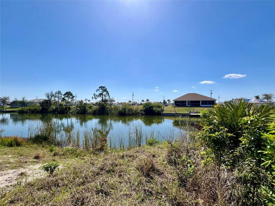 Great looking canal lot with southern rear exposure, this beautiful lot offers a unique opportunity to build the home of your dreams, Situated in Cape Coral a growing community, with Canal Access, this land boasts panoramic views and in a convenient location close to local amenities. With ample space to design and build, this lot is perfect for those looking to create their own personal paradise. Don't miss the chance to turn this land into your HOME!!