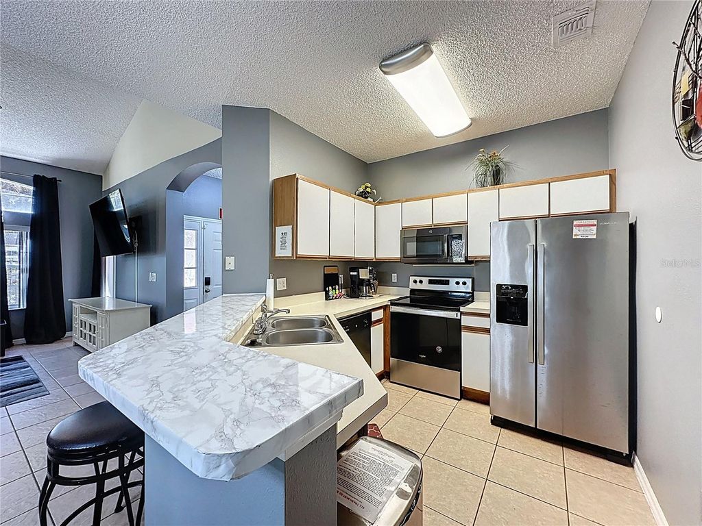 Photo of 8401 Crystal Cove Loop, Kissimmee, FL 34747 (MLS # O6382485)