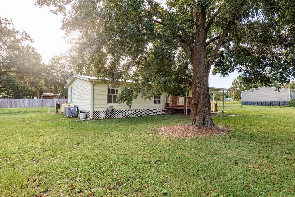 Photo of 6416 Candlewood Drive, Wesley Chapel, FL 33544 (MLS # TB8425433)