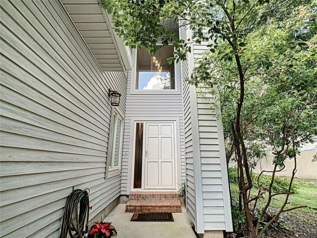 Photo of 9722 Tiffany Oaks Lane #14, Tampa, FL 33612 (MLS # A4666108)