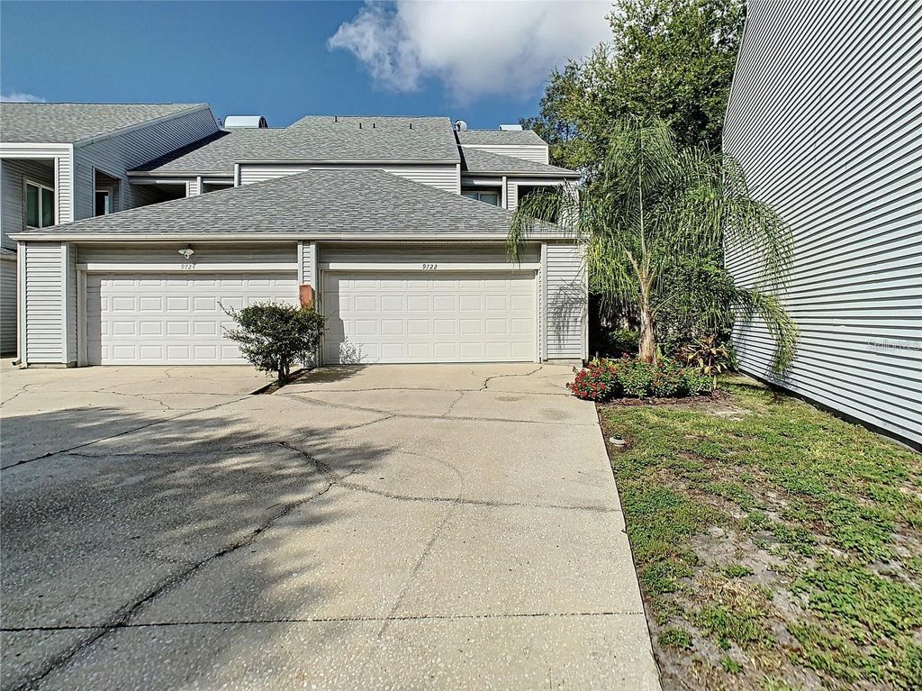 Photo of 9722 Tiffany Oaks Lane #14, Tampa, FL 33612 (MLS # A4666108)