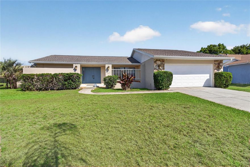 One or more photo(s) has been virtually staged. PRICED to SELL!! Welcome to your waterfront retreat! This beautifully updated 3-bedroom, 2-bath home offers the perfect blend of comfort and Florida living in Lake Padgett Estate East.  This lovely home features a desirable split floor plan, this residence provides both privacy and functionality for families and guests alike. Enjoy peace of mind with a new roof (less than one year old), fresh interior and exterior paint, brand-new carpeting and hotwater heater.

Step outside to the expansive lanai—ideal for relaxing or entertaining while taking in serene water views. The spacious 2-car garage adds convenience and extra storage, making everyday living effortless. This home is truly Turn Key.

Only a short stroll to the community clubhouse, residents enjoy access to an impressive array of amenities including a resort-style pool, fitness center, bar, tennis and pickleball courts, racquetball, walking track, playground, and basketball courts. This vibrant community offers something for everyone and truly enhances the Florida lifestyle.

Conveniently located near outlets, hospitals, restaurants, and a wide variety of shopping, great schools, this home offers both tranquility and accessibility.

Don’t miss the opportunity to enjoy waterfront living paired with exceptional amenities! Please be sure to take the 3D Virtual Tour.