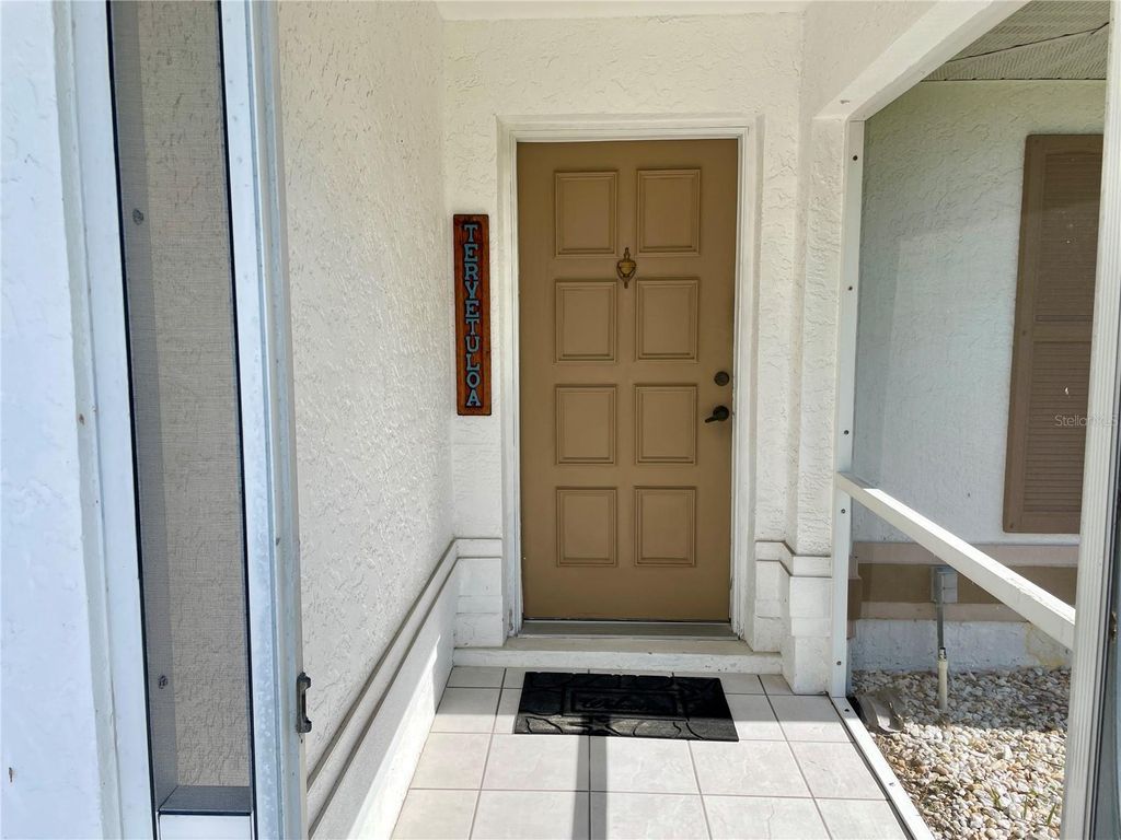 Photo of 23372 Mullins Avenue, Port Charlotte, FL 33954 (MLS # C7525697)