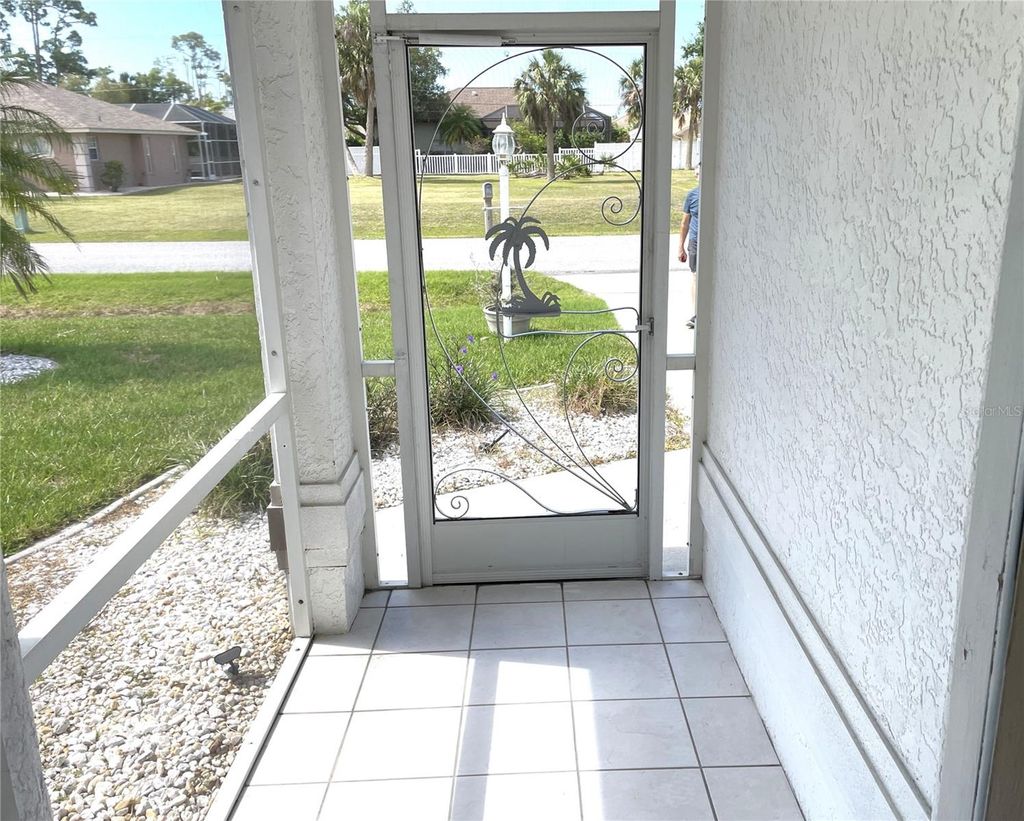 Photo of 23372 Mullins Avenue, Port Charlotte, FL 33954 (MLS # C7525697)