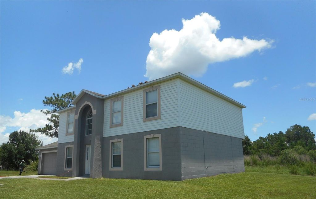 Photo of 950 Derbyshire Drive, Kissimmee, FL 34758 (MLS # S5146385)