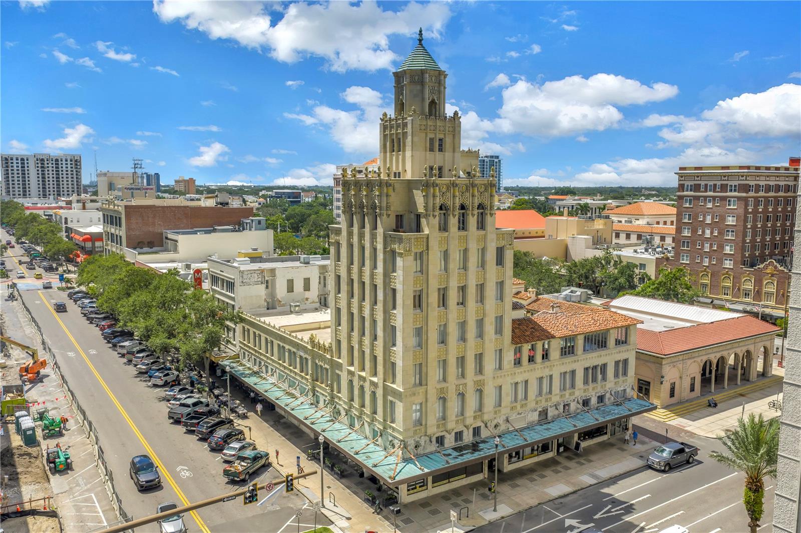 Discover refined urban living in this storied condominium within the timeless Mediterranean Revival Snell Arcade, an architectural treasure erected in 1926–28 by renowned developer C. Perry Snell and architect Richard Kiehnel, and now recognized on the National Register of Historic Places. Uniquely positioned in the heart of the city at Central Avenue & Fourth St, this exceptional 6th-floor home spans a generous 1,325 sq ft and welcomes you with the exclusive convenience of a private elevator opening directly into the condo's foyer. Upon entering, you’ll immediately appreciate the open floor plan—designed to favor both chic entertaining and comfortable everyday living—flowing from the living room to a kitchen outfitted with sleek stainless-steel appliances. Laundry day is effortless thanks to the in-unit washer and dryer, thoughtfully integrated into your private retreat. Beyond your doorstep lies the vibrant beat of St. Pete—enjoy a leisurely stroll to world-class museums such as the Dali & the James, acclaimed dining destinations, peaceful city parks along the waterfront, and the picturesque St. Pete Pier. Within easy access to I-275, the beaches and Tampa & St Pete-Clearwater airports.