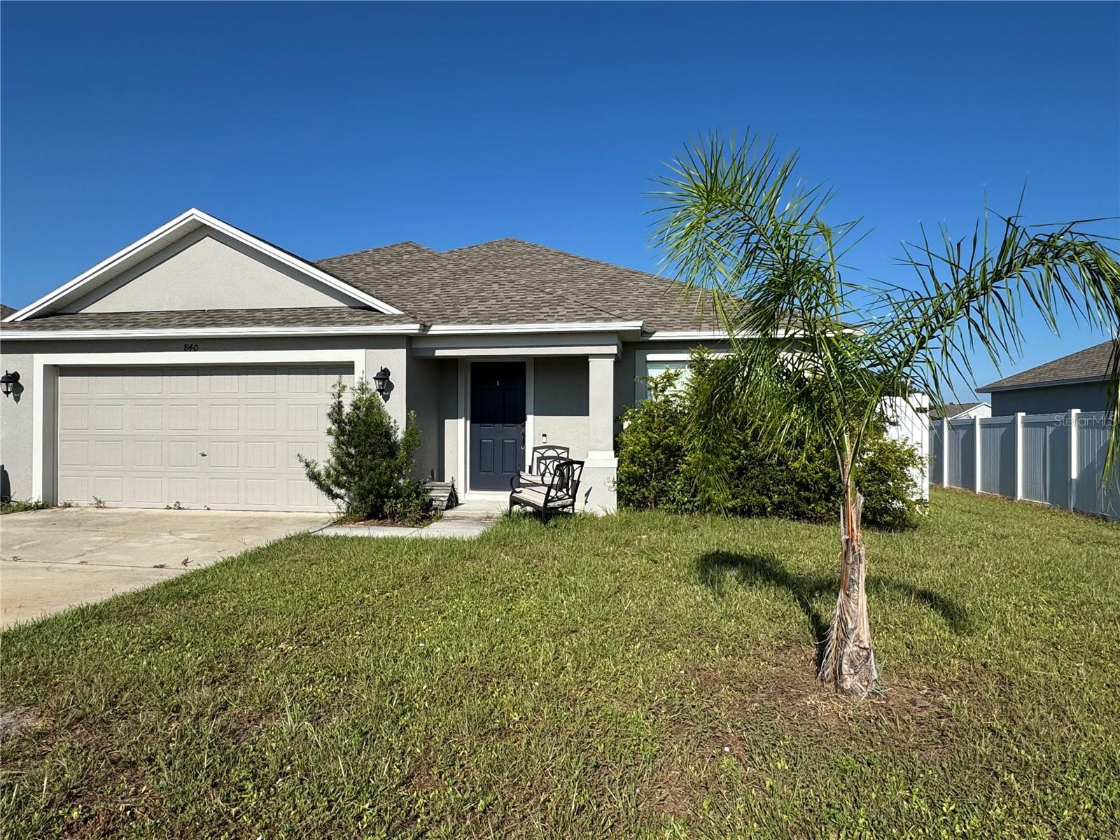 Beautiful 4-Bedroom Home Built in 2021-Central Frostproof Location--Welcome to this stunning newer home, built in 2021, offering 4 spacious bedrooms, 2 full bathrooms, and a stylish 2-car garage. Situated on a paved road in central Frostproof, this home combines comfort, modern design, and convenience in one perfect package. Step inside to soaring vaulted ceilings and an inviting open-concept layout. The front room offers flexible use as a formal living area, dining room, or even a large office or den. The kitchen, dinette, and family room flow seamlessly together--perfect for entertaining or everyday living. The split-bedroom layout includes three guest bedrooms tucked away for privacy, with the mater suite located just off the dinette area. The master bedroom features an en suite bath complete with a relaxing soaking tub. fully tiled walk-in shower, private water closet, double vanity, and a large walk-closet. The home includes luxury vinyl laminate flooring throughout most of the living space, with cozy carpeting in the bedrooms and main living room. A spacious walk-in laundry room offers extra storage space and convenience. The kitchen come equipped with stainless steel appliances including the range, microwave, and dishwasher. (Refrigerator, washer, and dryer do not convey-they are personal property of the owner.) Enjoy city water and a private septic system. Showings are by appointment only for the seller's convenience, as they work nights and sleep during the day. Don't miss your chance town this beautiful modern home in a great location-call today to schedule your private tour!
