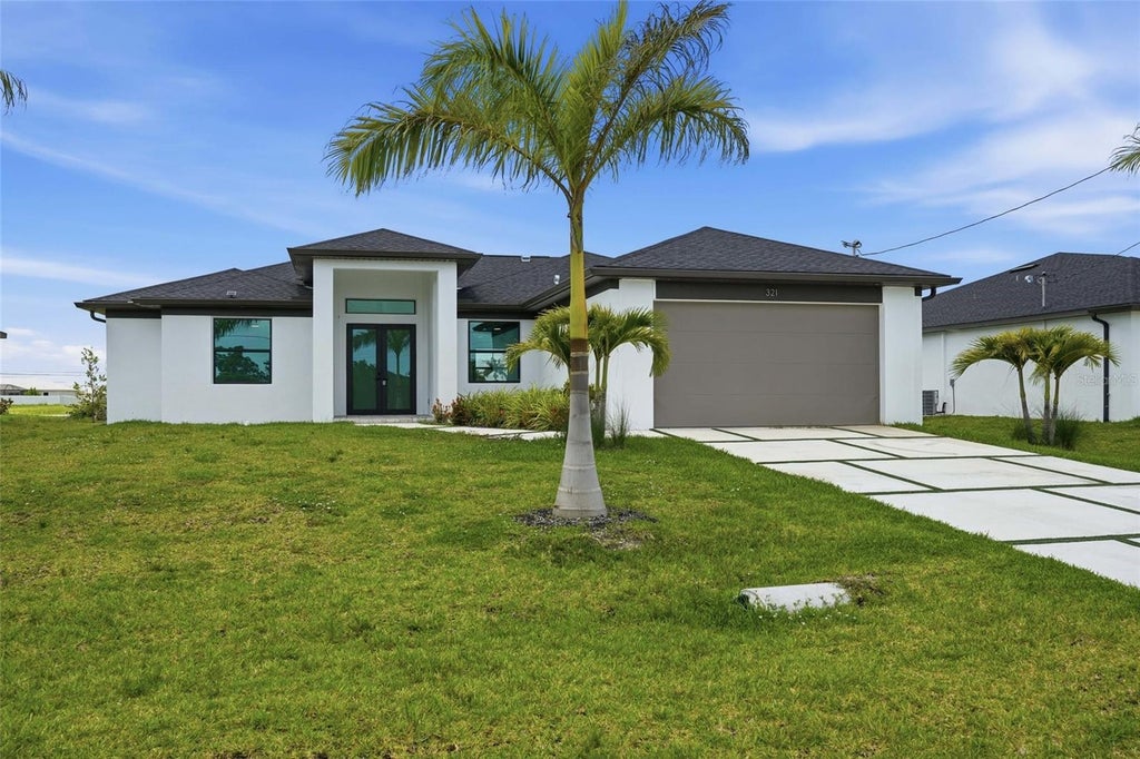 Photo of 321 NE 15th Terrace, Cape Coral, FL 33909 (MLS # O6443198)