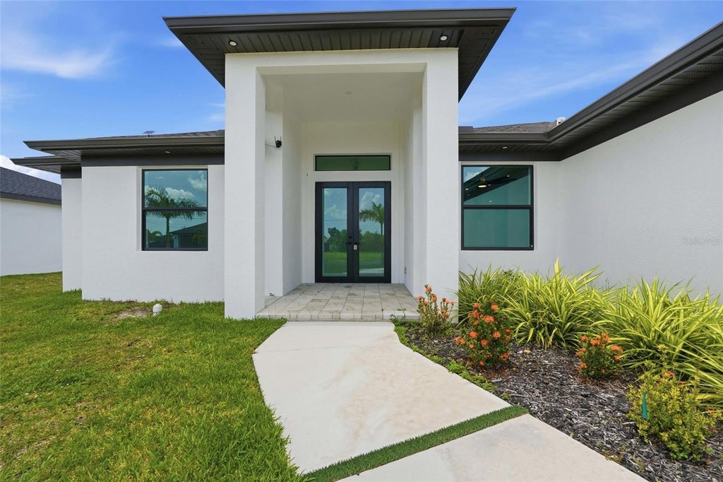 Photo of 321 NE 15th Terrace, Cape Coral, FL 33909 (MLS # O6443198)