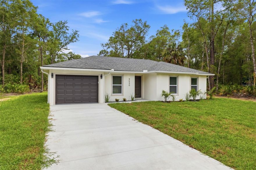 Welcome to 9590 W Tennessee Ln, a beautifully updated 3-bedroom, 2-bathroom home offering 1,078 square feet of stylish living space on a spacious 0.22-acre lot. Nestled among the natural beauty that makes Crystal River so desirable, this property provides the perfect blend of modern comfort and peaceful surroundings. No HOA or CDD, bring all of your animals and toys! Step inside to discover premium upgrades throughout, including luxury vinyl plank flooring, stunning waterfall-edge stone countertops, stainless steel appliances, and contemporary fixtures that create a fresh, modern feel. The thoughtfully designed floor plan offers comfortable living spaces, while the indoor laundry room adds everyday convenience. Outside, you'll appreciate the generous lot size and serene setting, with abundant wildlife and natural beauty right outside your door. Whether you're looking for a primary residence, vacation getaway, or investment opportunity, this move-in-ready home delivers exceptional value in a desirable Crystal River location. Don't miss your chance to own this beautifully upgraded home surrounded by Florida's natural charm! Up to $1,000 lender credit with seller's preferred lender.