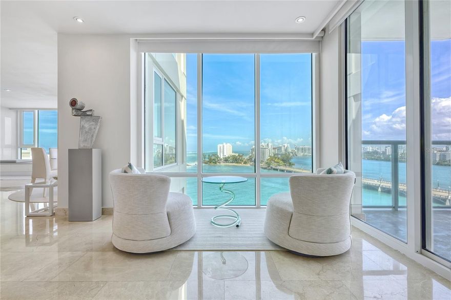 ***SOLD*** Coastal elegance defines this impeccably decorated 9th floor oceanfront residence at Laguna Plaza, in WeCo’s Paseo Caribe community. Floor to ceiling glass throughout bathes the entire 4,225 sq.ft of living space with Caribbean sunshine. Endless views of Condado Beach to the East, and mountains to the South, speak to the open- air feeling of this sophisticated space. The key access dual elevator opens onto your private landing, offering total privacy of residence. Impeccably furnished and designed, 4 full bedrooms plus office, 4 full baths and 1 powder room spread graciously within the 4,225 sq.ft of air conditioned space. Modern open air kitchen with stainless steel appliances, terraces off of the dining and primary suite, and killer sunrise views, make this one of a kind sub penthouse in the city. A full doorman building, Laguna Plaza is one of San Juan’s premier waterfront luxury buildings, offering concierge service, outdoor pool and spa, gym, lounge and underground garage parking. Inclusive of 3 garaged parking spaces. Monthly Condo Fee: $3,046.30.