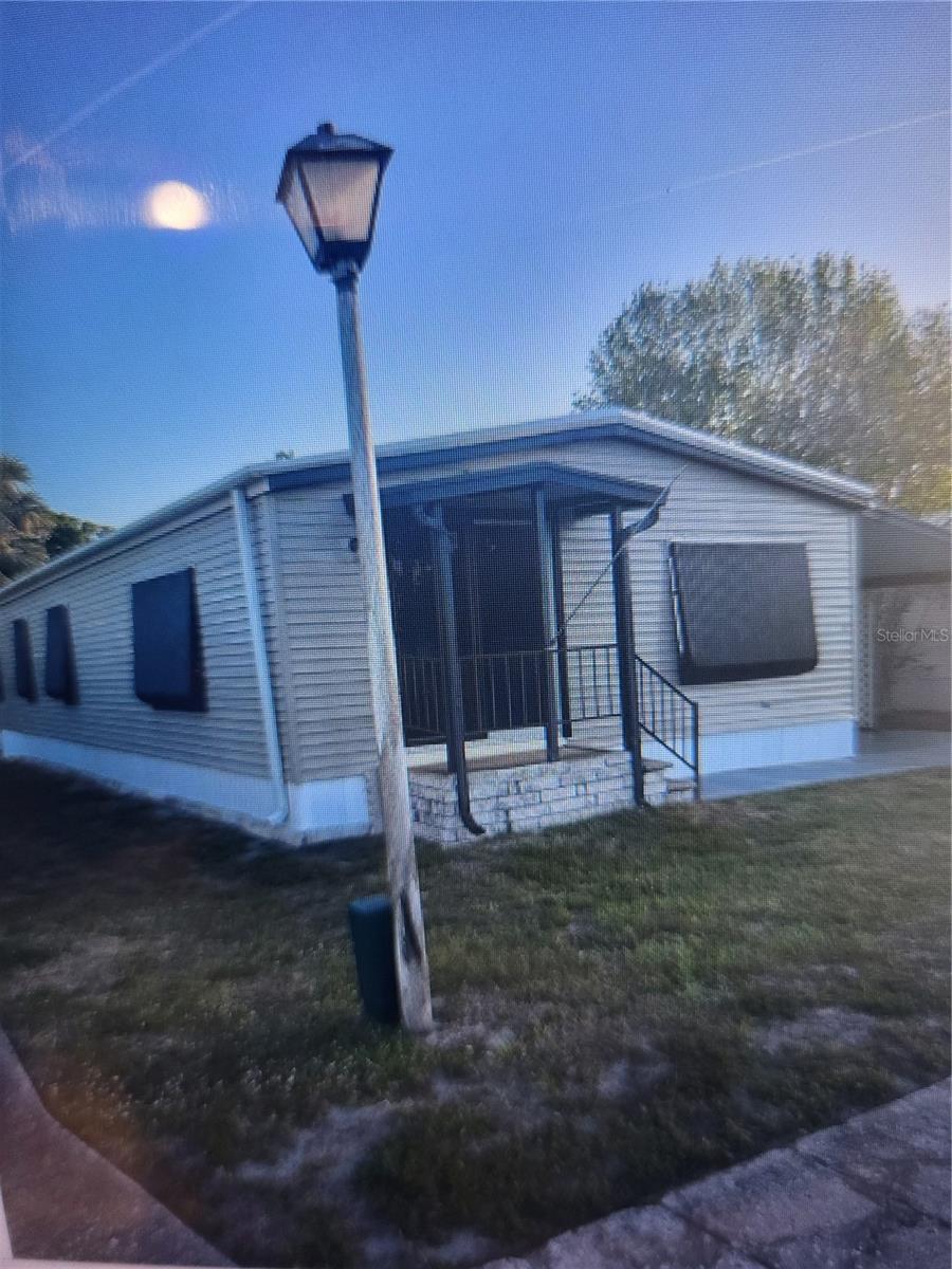 2/2 manufactured home is a small 55+ community, 14 units. Community swimming pool. Great location near Largo Mall, restaurants, public transportation, shopping, fitness center and more. Appliances include, fridge, range and oven, washer and dryer. Tankless water heater. Carport with storage/laundry.
Outside bonus room. Fenced yard.