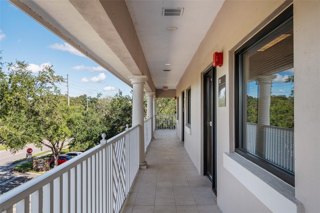 Photo of 2813 S Hiawassee Road #302, Orlando, FL 32835 (MLS # O6451636)