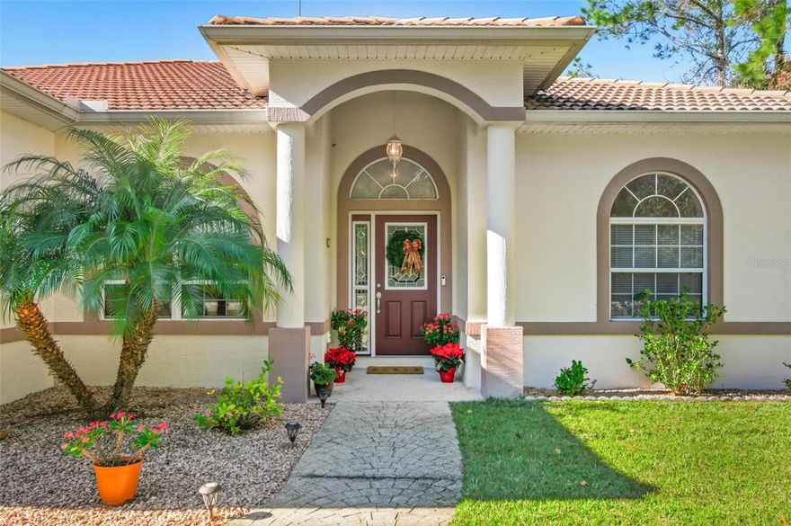 Welcome to 18 Pretoria Lane in beautiful Palm Coast, Florida—a well-maintained and thoughtfully updated home that blends comfort, style, and functionality.  This 3-bedroom, 2-bathroom residence with a 2-car garage features a durable tile roof and inviting curb appeal highlighted by a stamped concrete driveway. Inside, you’ll find a remodeled kitchen equipped with stainless steel appliances, perfect for both everyday living and entertaining. The home offers a mix of tile and laminate flooring throughout, providing a clean, modern look and easy maintenance.  One of the standout features is the additional living space created from the original large rear lanai, offering flexible use as a bonus room, home office, or hobby area. Step outside to enjoy the spacious screened lanai, ideal for relaxing or hosting guests year-round. The fully fenced vinyl backyard provides privacy and plenty of room for pets, play, or outdoor enjoyment.  Conveniently located in Palm Coast, this home is close to shopping, dining, parks, and beautiful Florida beaches. Don’t miss the opportunity to make this move-in-ready home your own—schedule your showing today!