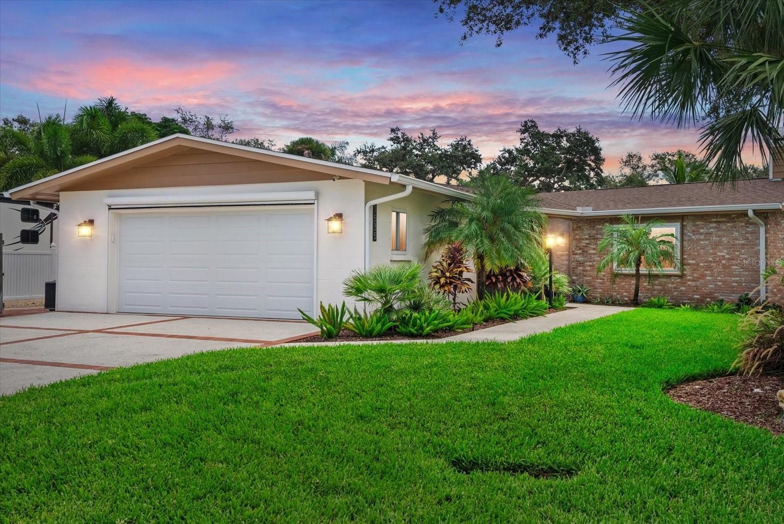 Move-in ready, beautifully remodeled home in desirable west of trail Coral Cove neighborhood w/ private 2-acre waterfront park & boat ramp. Upgraded, cul-de-sac gem w/ picturesque yard & screened entry welcomes you to a spacious living area w/ fireplace. Lovely Impact French doors in large dining rm maximize view of pool. Well-equipped kitchen, propane gas cooking, newer cabinets & SS appliances. Huge primary bedroom w/ ensuite bath & closet built-ins. Impeccably maintained, newer roof, updated bathrooms & energy efficient windows. Backyard oasis w/ newer pool, paver deck & covered Lanai w/ motorized screen. 2-car oversized garage also w/ motorized screen, Boat/RV area w/ power, plus more exciting features & upgrades! Home has finished floor elevation of 15.56'. Prime location by shops, dining, Siesta Key Beach & Legacy Trail. A must see!