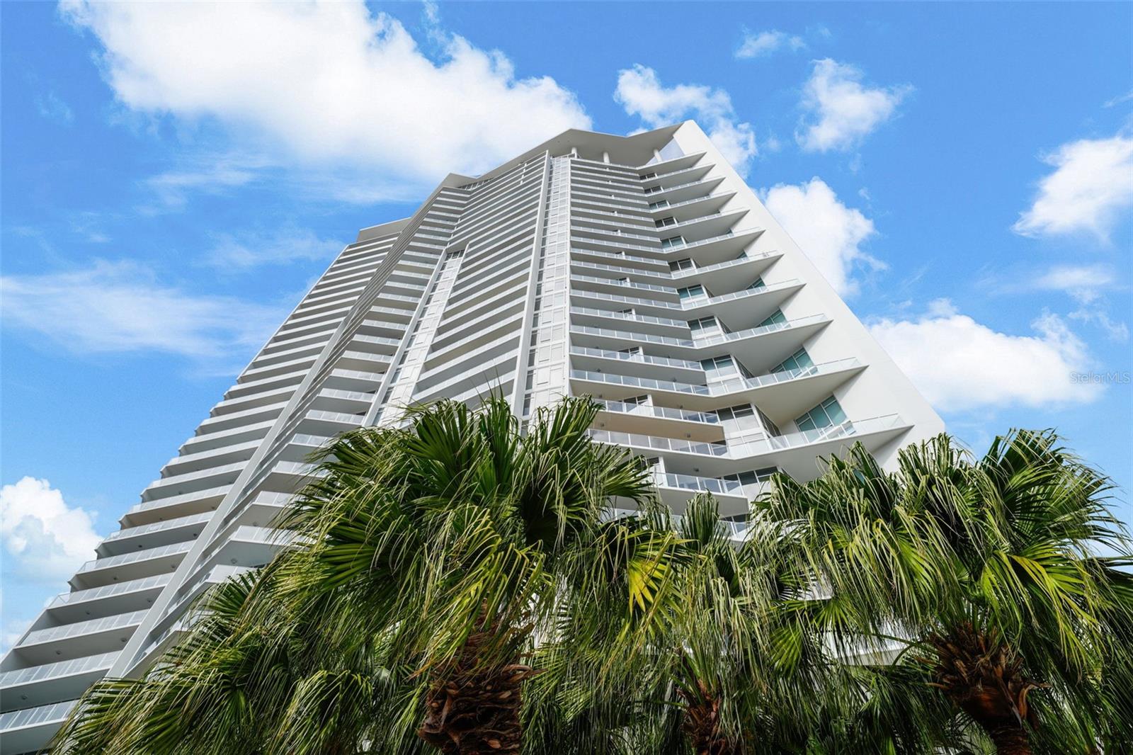 Welcome to Unit 3102 at Signature Place, where sleek modern design and breathtaking views converge in the heart of downtown St. Petersburg. This 3-bedroom, 3 bathroom residence, complete with a versatile den, redefines luxury living with its open layout, four expansive balconies, and floor-to-ceiling windows that flood the space with natural light. Imagine waking up to sweeping views of Tampa Bay and downtown St. Pete, enjoying your morning coffee as the city comes to life below. The chef’s kitchen, equipped with premium Thermador and Miele appliances, is perfect for hosting intimate gatherings or preparing a quiet dinner to enjoy on one of your private balconies. The primary suite is a sanctuary of relaxation, while the entertainment space provides the perfect spot to unwind, read, or simply take in the stunning vistas. This home lives like a single-family residence, offering both privacy and connection to the vibrant energy of the city. Amazing den lends to additional space to enjoy privacy and peace. Signature Place is more than a residence—it’s a lifestyle. From the Zen-inspired pool deck overlooking the water to the 24-hour concierge and fitness center, every detail is designed to elevate your everyday experience. With secured parking, storage, and proximity to Beach Drive, museums, marinas, and world-class dining, this is your opportunity to live the ultimate urban-coastal lifestyle. Don’t just dream it—live it. Schedule your private tour today and claim your place in the sky at Signature Place.