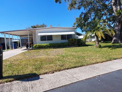 Photo of 65 Harbor Way #21, Palm Harbor, FL 34684 (MLS # TB8472809)