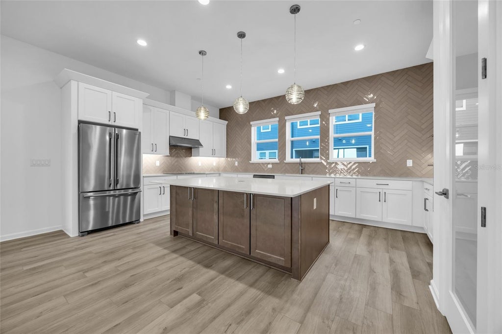 Photo of 9305 Luminary Boulevard, Orlando, FL 32827 (MLS # O6437503)
