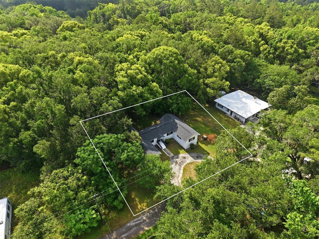 Photo of 65 Markham Lane, Brooksville, FL 34601 (MLS # W7885764)