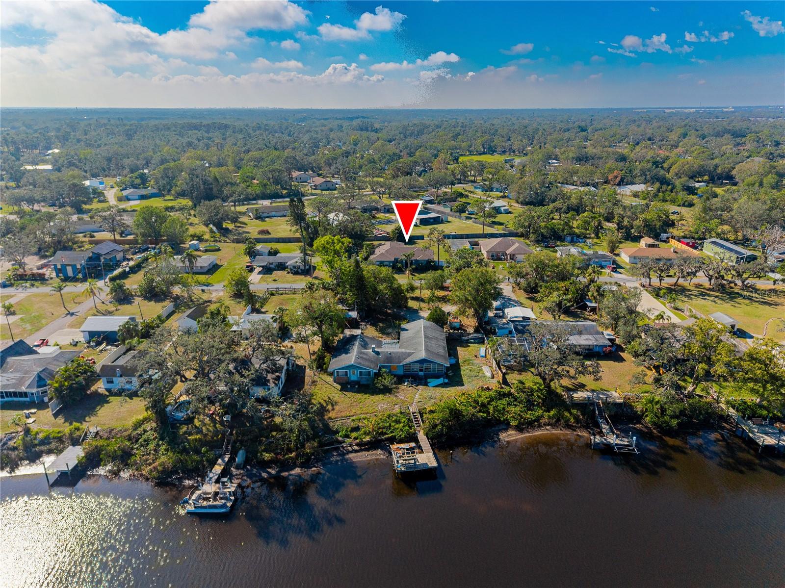 This home is Florida living at it's BEST & w/no STRESS! NO CDDs, NO HOAs, NEWLY RENOVATED, NEWER ROOF, AC & WATER HEATER and NO FLOOD ZONE!! All the big ticket items have been taken care of for you. The Elwood Park Community is one of Bradenton's best kept secrets! Tucked quietly away from the hustle and bustle of this growing city, you'll enjoy country living without being miles away from civilization. With over 2500 sq. ft. of amazing living space, this home has everything you could want. With a paver driveway and walkway leading to your wide front porch, you will be greeted by an expansive formal dining & living room with sweeping views of the backyard through a pair of French Doors. With 4 large bedrooms and 3.5 baths, this home offers plenty of space, with comfortable living for all. To the right of this split plan home, you'll see a spacious primary bedroom with an ensuite bath. It has direct access to the backyard, a large
luxurious shower with multiple shower-heads, soaking tub and 2 Walk-in closets. Do you have a multi-Gen living situation, young adults or other shared space needs? Then you will love this secondary suite, which also has a generously sized bedroom, ensuite bathroom with shower/tub combo & it's own large walk-in closet. There are two additional nicely sized bedrooms and a whole other Full & half bath to see as well! And in addition to all of this, you'll have a very well-appointed kitchen, featuring granite countertops, giant island w/available seating, stainless steel appliances, and more. This home has so much to offer, we can't list it all! You must see it for yourself. The Backyard has tons of potential. You can make the yard into your own private oasis, put in a pool, park your work vehicles, RVs, boats, or any other toys and still have plenty of space for entertaining your friends and family! And the best part, you'll get it an affordable price and you're still only 10-15 mins from I-75, making it a quick commute to Tampa, St. Petersburg, Sarasota, Naples & the like. This home is perfectly located for easy access to shopping, dining, and the beaches. This is a MUST see, so call me to make your appointment TODAY!