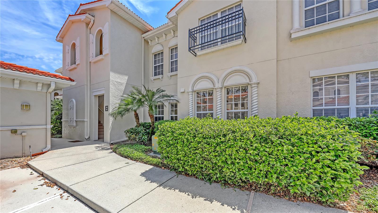 BRIGHT and CHEERFUL, three bedroom, two bathroom, FIRST FLOOR, end unit condo with 1 car detached garage in popular Ravinia! Sparkling clean and in beautiful move in condition with a private tropical preserve view welcoming you the minute you walk in the front door! High ceilings and lots of natural light pours in from the sliding glass patio door and many windows to give the space a light and airy feel. On trend light toned laminate flooring in the living area. Plenty of storage in the kitchen with beautiful floor to ceiling cabinets along one wall and a nice sized kitchen island, perfect for entertaining family and friends. Relax and enjoy the warm breezes in the covered, screened in lanai overlooking the views of the lush tropical preserve. The primary bedroom has an ensuite bathroom with dual sinks and a roomy walk in closet. There's a full sized washer and dryer, laundry sink and more cabinets inside the laundry room. Venture over to the beautiful heated community pool for a refreshing swim. Ravinia is in a great location close to two public golf courses and Venice Island, where you will have fun discovering sandy beaches, delicious restaurants, boutique shoppes, festivals and much more! If you love going for walks, the sidewalks of Capri Isles Blvd are a beautiful place to do so and just a few steps away. Sold Turnkey, all furniture and items are included and ready for you to move in today! Great Rental potential here with Association approval. Now is the time to make this beautiful condo yours!