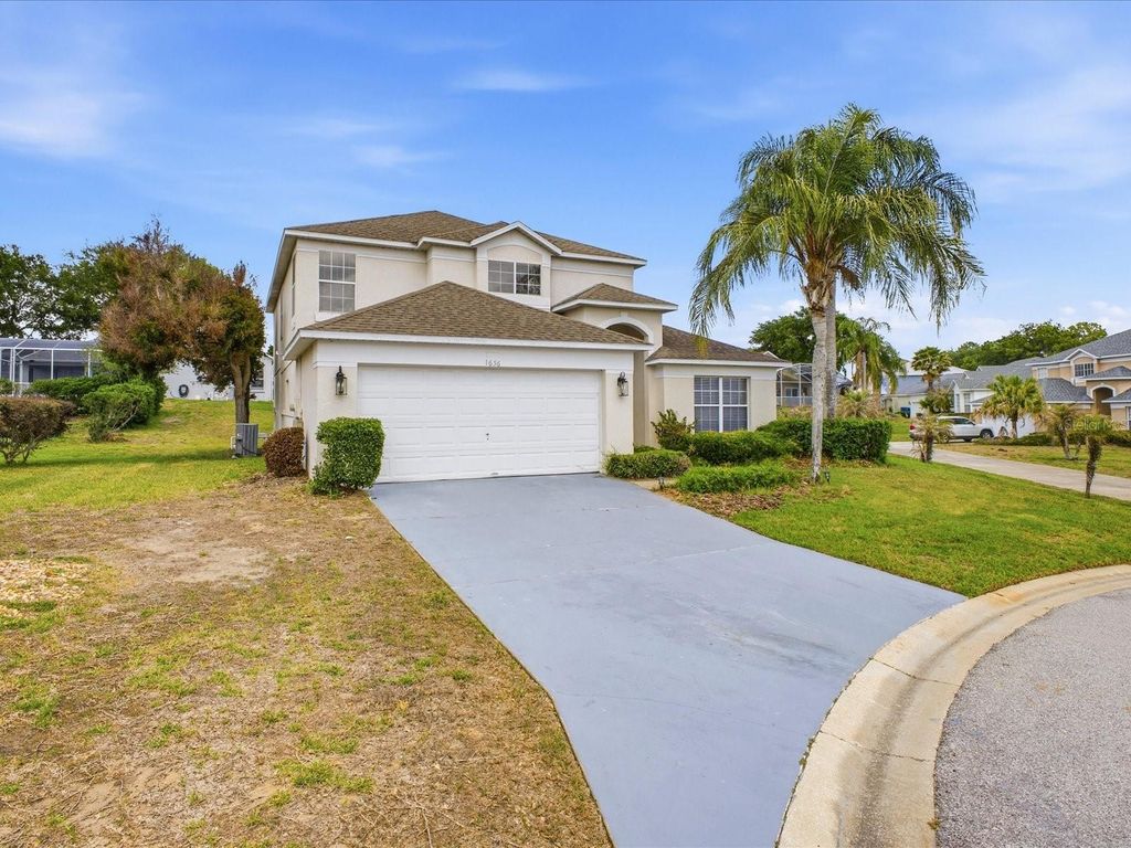 Photo of 1656 Dunes Ct, Haines City, FL 33844 (MLS # O6402686)