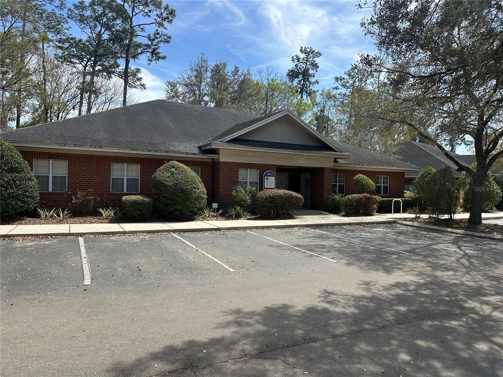 Medical office for lease in the beautiful NW 53rd Ave business corridor by Hunter's Crossing Publix plaza. Beautiful brick facade, lovely landscaping, plenty of parking. Suite consists of large reception area, 15 offices, 3 restrooms and kitchenette. May be able to be demised for the right tenant.