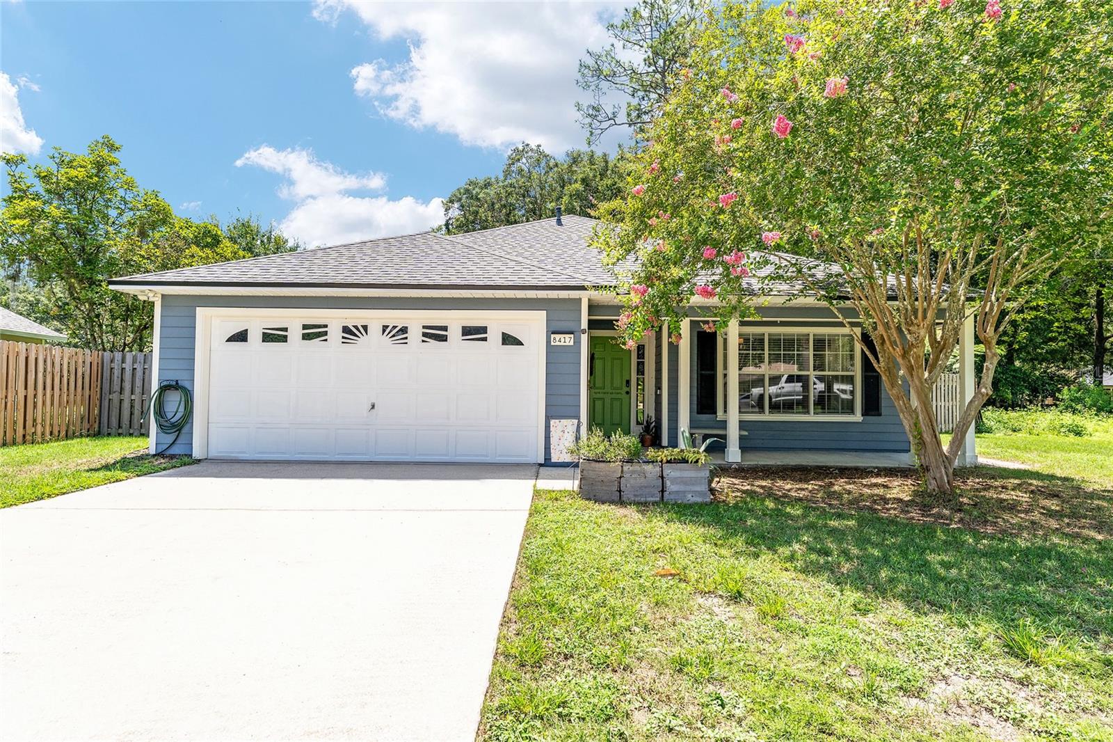 Welcome to this beautiful, move-in-ready 3-bedroom, 2-bath home! Stylishly updated throughout, this home features luxury vinyl plank flooring, fresh paint, granite countertops, a fireplace and more. The kitchen opens up to a spacious screened-in lanai that overlooks a large backyard—complete with a wood deck, fire pit area, and privacy fence—making it the perfect space for entertaining. Tucked away on a quiet cul-de-sac and backing up to peaceful green space, this home offers a serene atmosphere while still being conveniently close to top-rated schools, Celebration Pointe, and I-75. The community also offers fantastic amenities including a pool, tennis courts, playground, and clubhouse. Don’t miss your chance—schedule a tour today!
