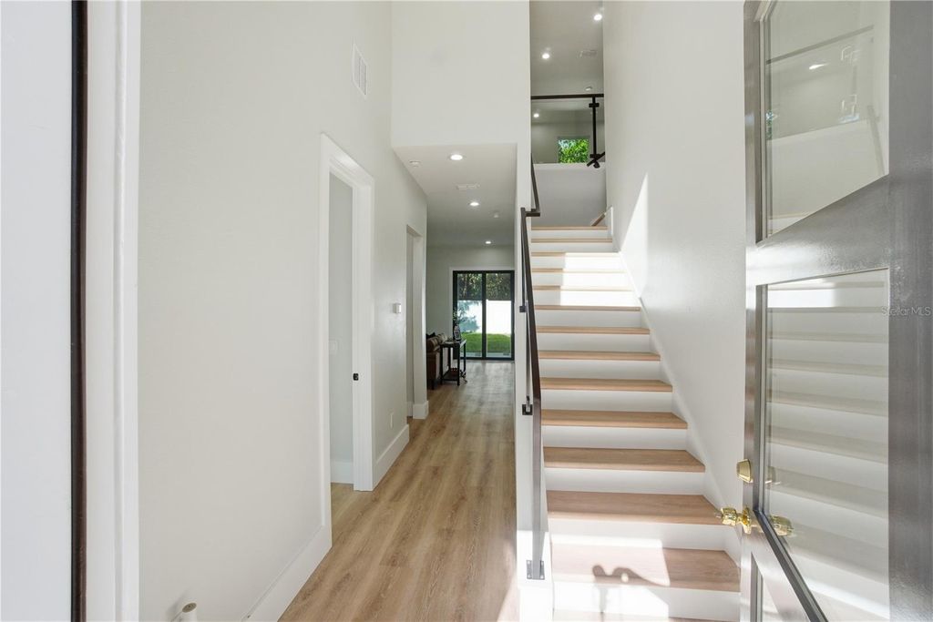 Photo of 5719 Peninsular Drive, Belle Isle, FL 32809 (MLS # O6353632)