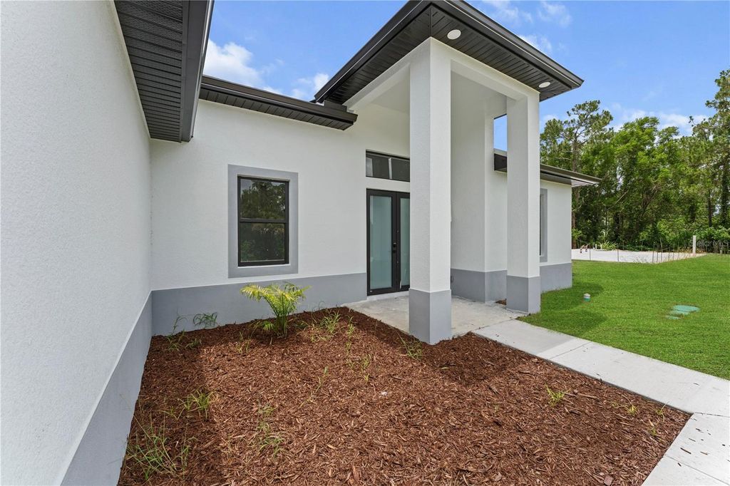 Photo of 353 Nathan Avenue, Lehigh Acres, FL 33974 (MLS # A4669965)