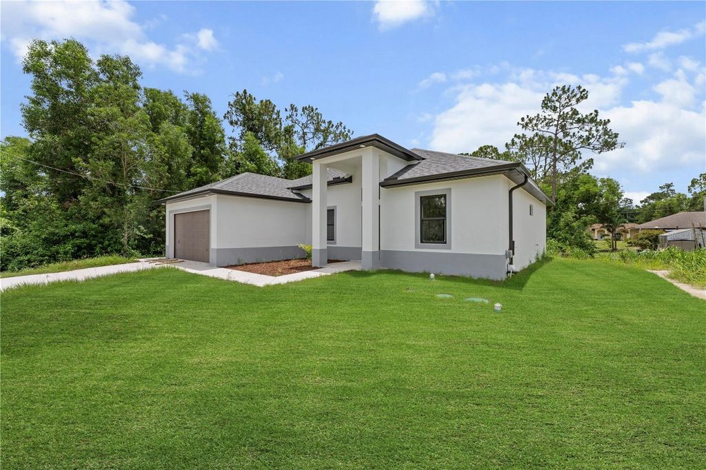 Photo of 353 Nathan Avenue, Lehigh Acres, FL 33974 (MLS # A4669965)