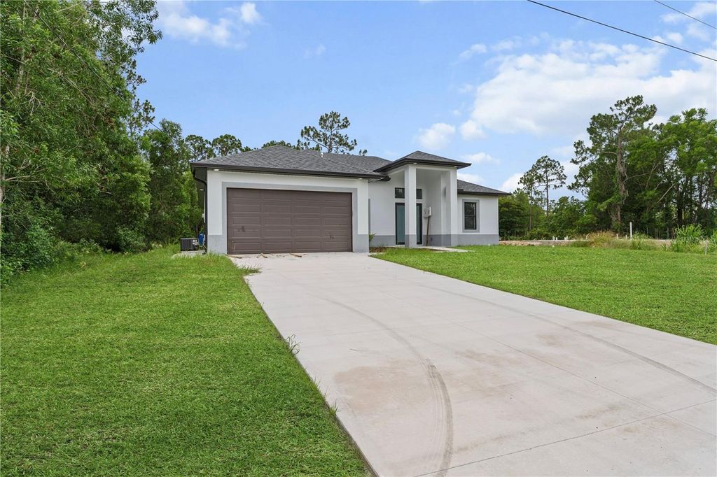 Photo of 353 Nathan Avenue, Lehigh Acres, FL 33974 (MLS # A4669965)
